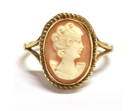 A CAMEO RING The ring set in unmarked yellow metal with the cameo measuring 1.7 x 1.4 cm Ring size S, weight 3.3g