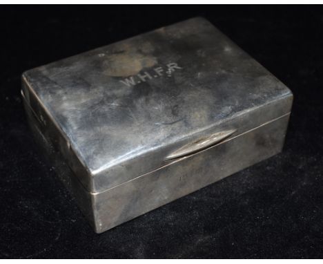 A SILVER BOX OF PLAIN FORM Monogrammed initials to the lid , side dated 15.12.27, inset with wood, hallmarked for Birmingham 