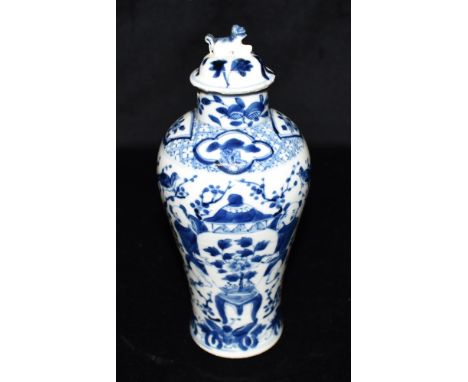 A CHINESE PORCELAIN LIDDED VASE OF BALUSTER FORM  underglaze blue painted decoration of pair of figures holding a vase, four 