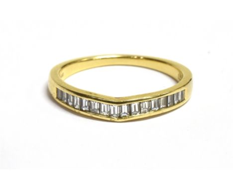 18CT GOLD CHANNEL SET DIAMOND HALF ETERNITY BAND The band marked with import scales 750, 0.5CT, band width 4mm, ring size P ½