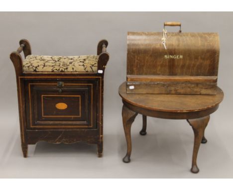 An Edwardian piano stool, a Singer sewing machine and an early 20th century coffee table. The former 54 cm wide.