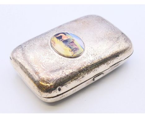 A silver and enamel cigar case depicting two greyhounds. 13 cm long. 191 grammes total weight. 