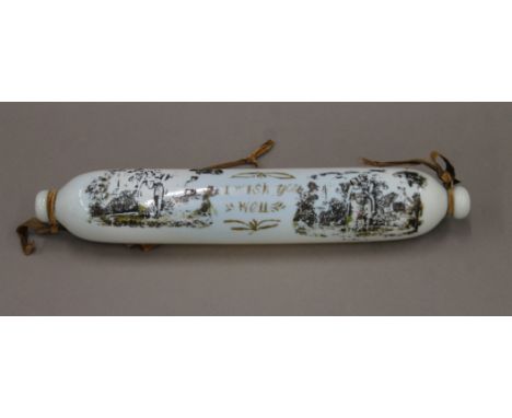 A glass rolling pin. 34 cm long.