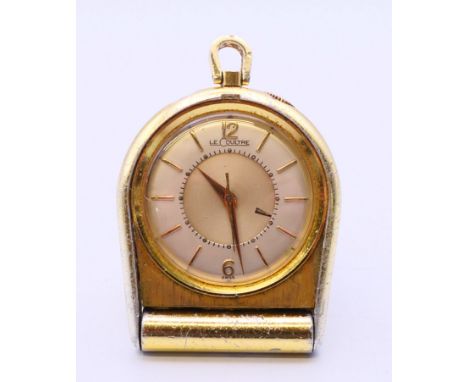 A LeCoultre travel/pocket watch.  4.5 cm high. 