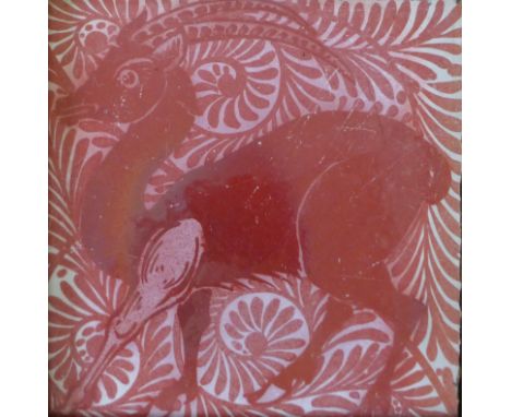 A William de Morgan lustre tile with impala design, framed. 15 x 15 cm.