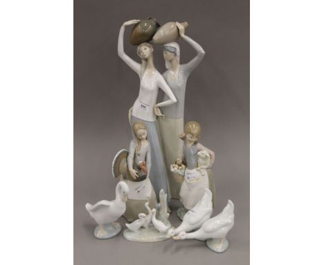 A quantity of Lladro and Nao figures. The largest 47 cm high. 