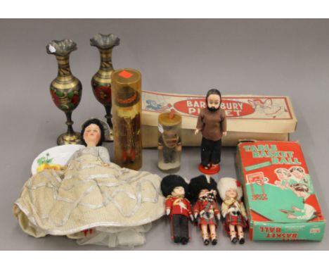 A quantity of items including a boxed Barnsbury puppet, a boxed table basketball game, a pair of brass vases etc. The latter 