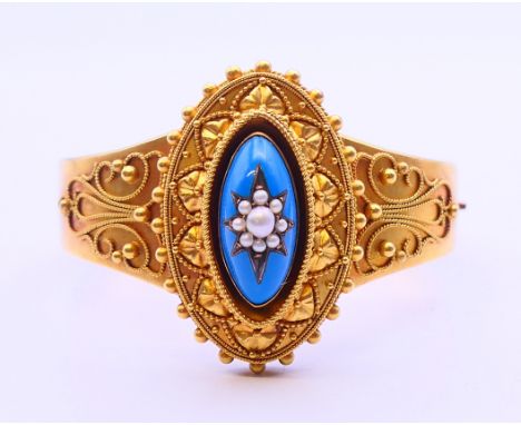 A Victorian boxed unmarked (tests as 14/15 ct gold) seed pearl and enamel bracelet. 5.5 cm inner width. 