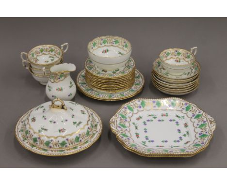 An English part tea set, circa 1880-1900, retailed by Thomas Goode and painted with the angouleme sprig pattern.