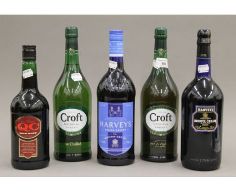 Five various bottles of sherry - two Croft, two Harveys and a QC Rich Ruby. The former 27 cm high. 