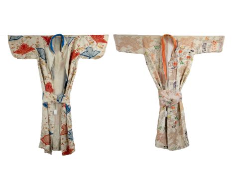 TWO JAPANESE LATE MEIJI (1868-1912) AND 20TH CENTURY CREAM SILK KIMONOS. The first, perhaps a wedding kimono (uchikake) decor