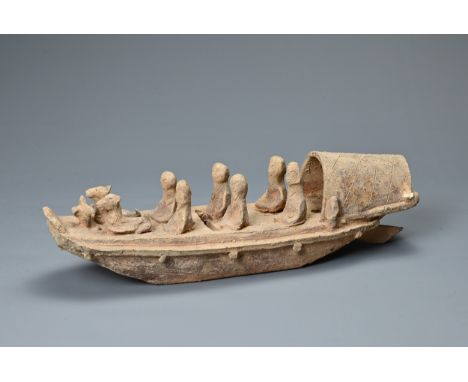 A CHINESE POTTERY MODEL OF A BOAT WITH RUDDER, HAN DYNASTY STYLE. Close examples are known found in Guangdong province, early