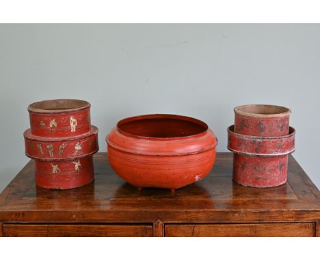 TWO CHINESE RED LACQUER STORAGE CONTAINERS AND A FOOTED GLOBULAR JARDINIERE, 19TH/EARLY 20TH CENTURY. The containers or cover