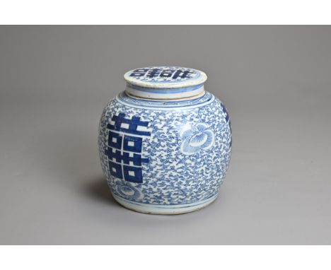 A CHINESE BLUE AND WHITE DOUBLE HAPPINESS JAR AND COVER, 19TH CENTURY. On a floral scroll ground. 21cm tall.Shallow chip to e