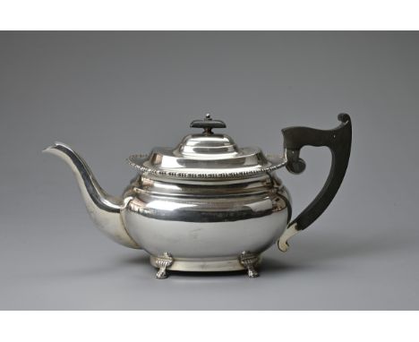 A SILVER OBLONG TEAPOT. Hallmarked Sheffield, 1952, makers marks for Viner's Ltd, with turned wooden handle and finial, beade