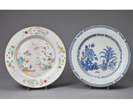 TWO LARGE CHINESE EXPORT PORCELAIN DISHES, 18TH CENTURY. To include a famille rose decorated with figures; Together with a bl