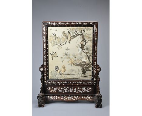 A CHINESE MOTHER OF PEARL INLAID SILK EMBROIDERED SCREEN, 19TH CENTURY. Depicting one hundred birds scene mounted in a hardwo