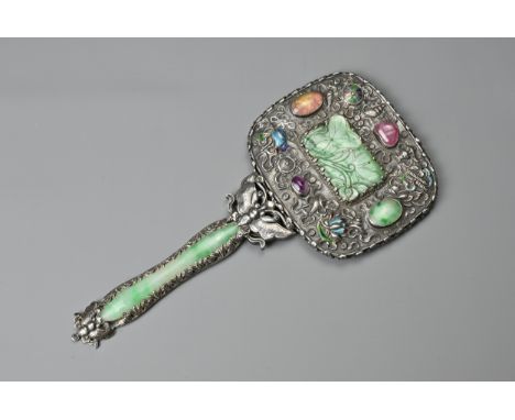 A CHINESE EXPORT SILVER HAND MIRROR, EARLY 20TH CENTURY. On a butterfly handle with jade insert with a square form mirror dec