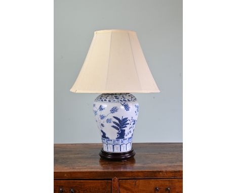 A CHINESE BLUE AND WHITE PORCELAIN LAMP. The vase of meiping shape decorated with the three friends of winter. Mounted on woo