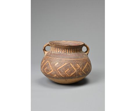 A FINE CHINESE NEOLITHIC MACHANG PHASE PAINTED POTTERY JAR, MACHANG PHASE (c.2300 – 2000 BC). Made from a fairly high-fired p
