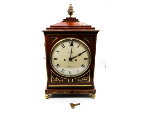 J. Poole of London, rosewood bracket clock with brass floral inlay to front, sides and edges, pineapple finial and standing o