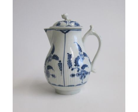 A Worcester sparrow beak jug and cover, of finely reeded form with scroll handle, the cover with a flower finial, painted in 