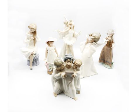 Lladro: four figures including a young native north American squaw, a young couple wearing clown and princess costumes, a che