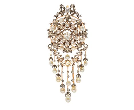 An Edwardian diamond and pearl set brooch/pendant, comprising a rose gold diamond set tiered circular frame, set to the centr