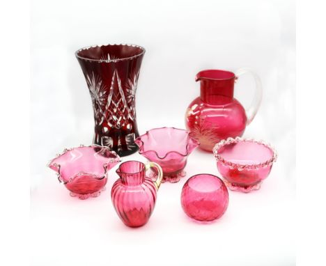 A collection of late 19th or 20th century cranberry or ruby glass to include; a tall etched ruby glass vase approx. 25cm high