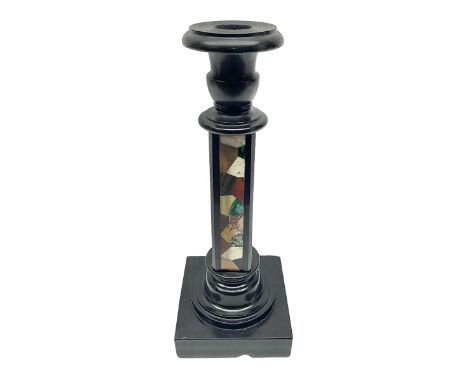 Black stone column candlestick, with mineral specimens upon two sides, H30cm