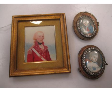 Three portrait miniatures: a late 18th century style redcoat officer, and a pair of oval diamante framed miniatures within a 
