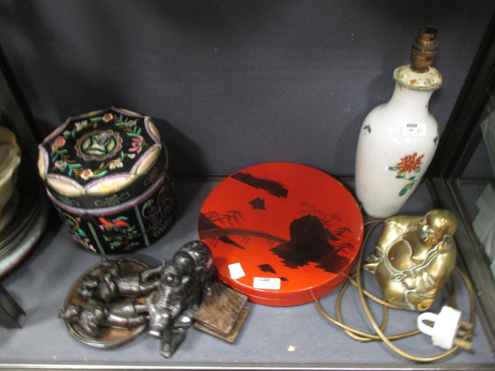 An Asian porcelain circular hors d'oeuvres set in lacquer case (one