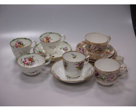 A Rockingham trio and cup and saucer; two Derby Sampson &amp; Hancock trios; a Spode coffee cup and saucer; two English porcl