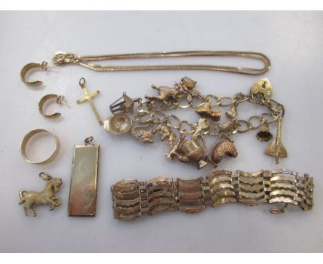 A collection of 9ct gold jewellery including a chain, charm bracelet, gate bracelet, wedding ring etc, 64.3g gross  