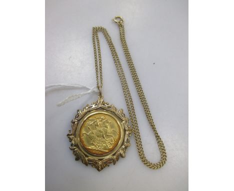 A curb link chain supporting a 9ct gold pendant with a full sovereign, 14.6g gross  