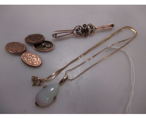 A pair of 9ct gold cufflinks, and opal pendant on a 9ct gold chain and a bar brooch stamped '9c' 9.3g gross (3)  