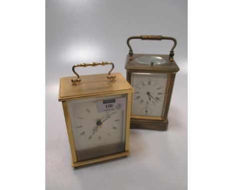 An early 20th century carriage clock with subsiduary second hand and alarm, together with a modern carriage clock  