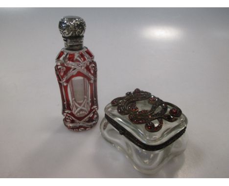 An early 20th century Continental rock crystal and garnet pill box, 5cm wide together with Victorian ruby flash perfume bottl