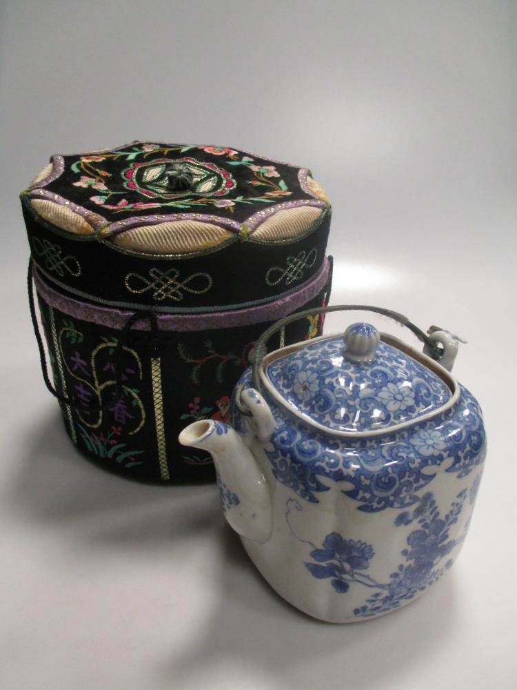 An Asian porcelain circular hors d'oeuvres set in lacquer case (one
