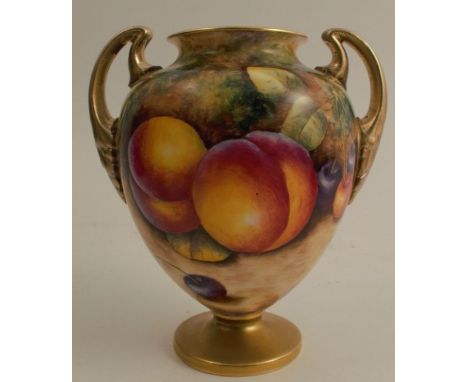 A Royal Worcester pedestal vase, decorated to the front with fruit to a mossy background by R Lynes, with gilt handles and fo