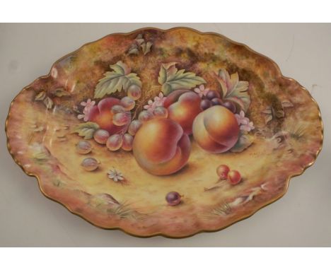 A Royal Worcester oval tureen stand, decorated all over with hand painted fruit by P English, maximum diameter 15.25ins good 