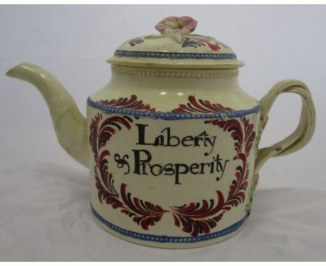 An 18th century William Greatbatch creamware teapot, decorated with Liberty &amp; Prosperity within an iron red and black fra