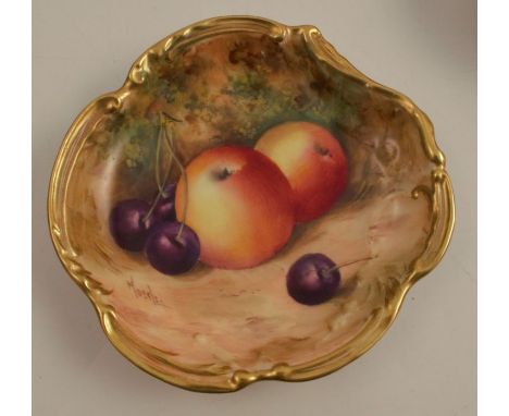 A Royal Worcester dish, with shaped gilt edge, decorated with fruit to a mossy background by Moseley, dated 1936, diameter 4.
