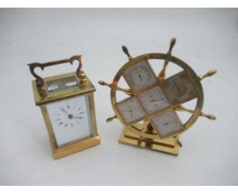 An Angelus pilot wheel, with calendar, barometer, hygrometer and thermometer, height 7ins, together with a carriage clock, he