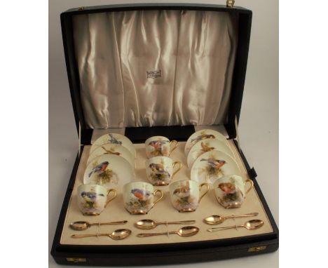 A Royal Worcester cased coffee set, comprising six cups and saucers, decorated with named birds by Ernest Barker, circa 1939 