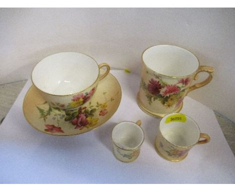 A Royal Worcester tea cup and saucer, together with three mugs, heights 3ins and down, all decorated with flowers to a blush 