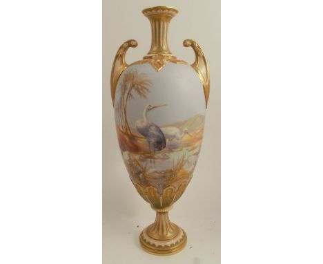 A Royal Worcester vase, decorated in an all around landscape with storks next to an oasis by W Powell, shape No. H179, dated 