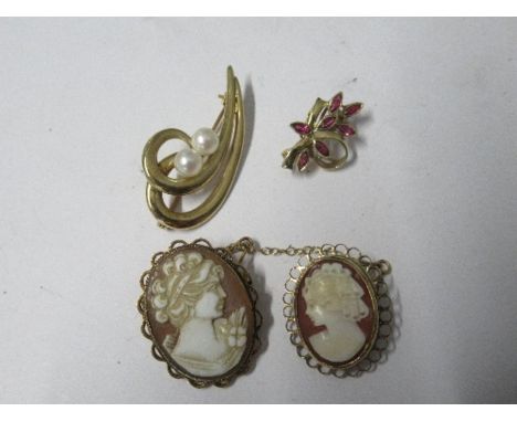 A 9 carat gold cultured pearl brooch, together with a 9 carat gold ruby set brooch, 7.6g gross, and two shell cameo brooches