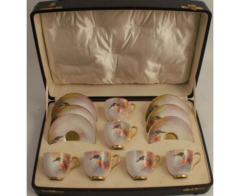 A Royal Worcester cased coffee set, comprising six cups and saucers, decorated with kingfishers on a branch, by William Powel
