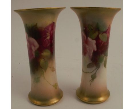 Two Royal Worcester trumpet shaped vases, decorated with roses, shape number G923, dated 1915 and 1917, height 4.75ins no obv